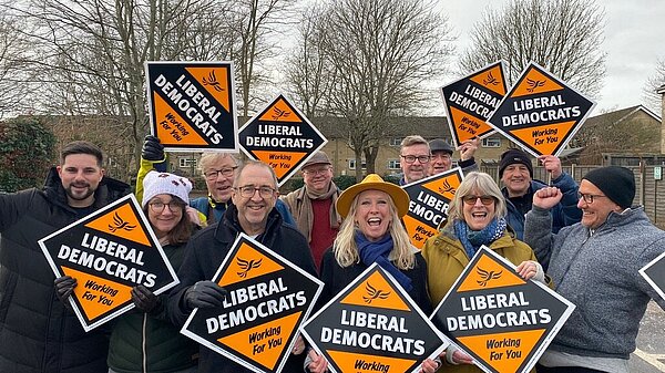 A group of Liberal Democrat supporters cheering