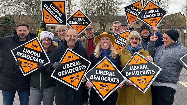 A group of Liberal Democrat supporters cheering